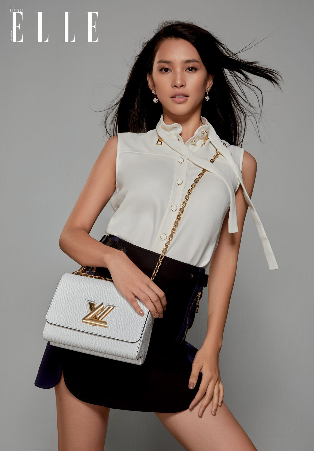 hoa hậu Tiểu Vy mang túi Louis Vuitton